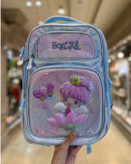 کولهپشتی مدرسهای دخترانه با طرح یونیکورن، پری دریایی و شخصیت کارتونی در رنگهای فانتزی پاستلی