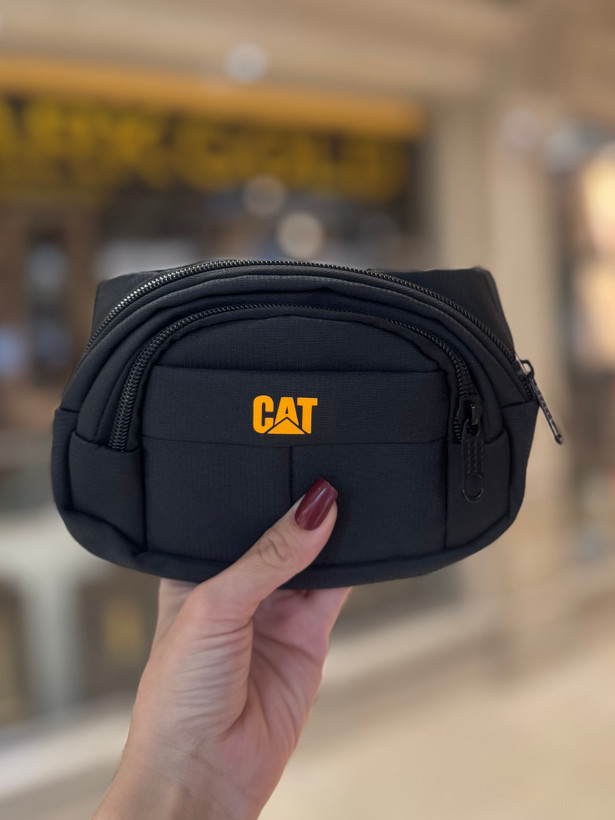 کیف کمری مشکی مارک CAT برزنتی با زیپهای روان و پشت توری ضد تعریق.